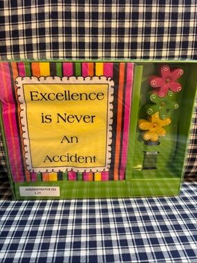 Main Street collection napkin and spreader set. “Excellence is never an accident
